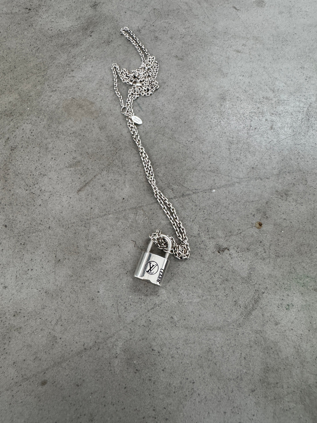 LOUIS VUITTON LEARN PADLOCK