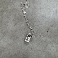LOUIS VUITTON LEARN PADLOCK