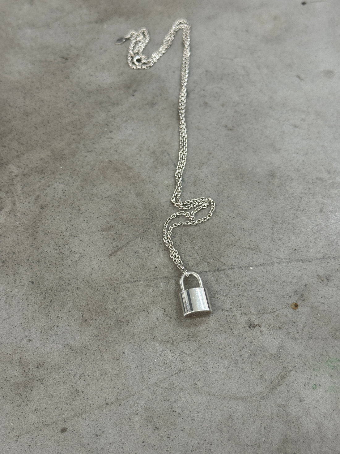 LOUIS VUITTON LEARN PADLOCK