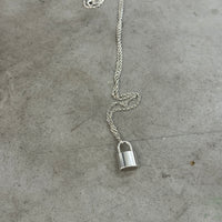 LOUIS VUITTON LEARN PADLOCK